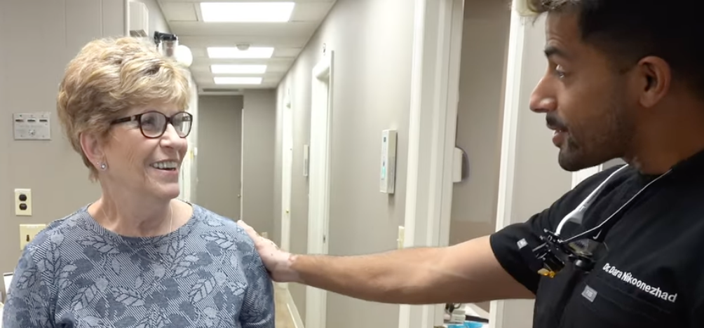 Dr. Nikoonezhad with a patient at South Jersey Dental Studio